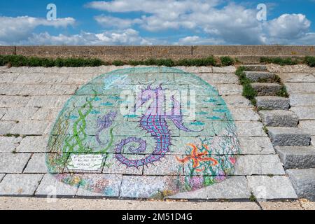 seahorse painted on a wall to warn that pollution is killing our oceans Stock Photo
