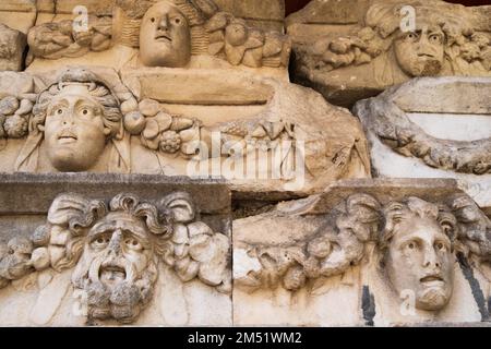 Sculpted Greek mask recovered from the ruins of the theater of Aphrodisias ancient city Aydin, Turkey Stock Photo