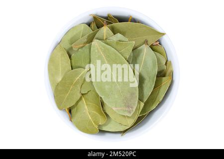 Bay leaf leaves spice herb from above bowl isolated on a white background Stock Photo