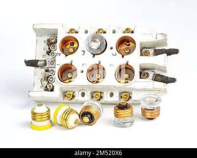 Ceramic fuse box with screw in fuses Stock Photo