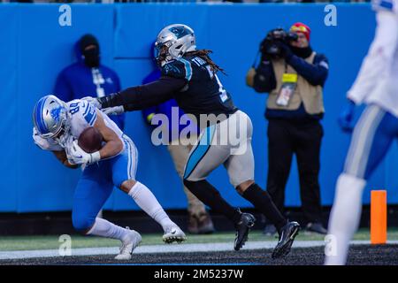 Charlotte, NC, USA. 24th Dec, 2022. Detroit Lions wide receiver Jameson  Williams (9) runs to tight end Shane Zylstra (84) after the touchdown  during the first half of the NFL matchup against