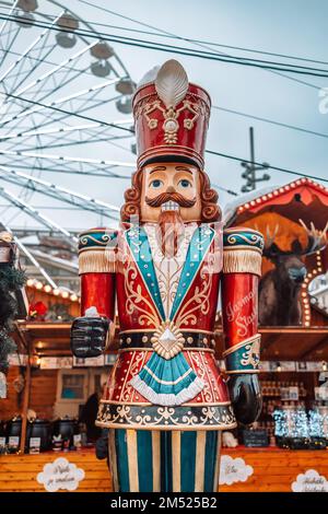 Handcrafted wood Nutcracker toy Christmas Market in Katowice, Poland. Festive nutcracker soldier toys  Stock Photo