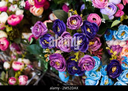 Fake colorful flowers for decorative purposes Stock Photo