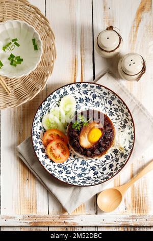 Lo Ma Kai Dim SUm, Steamed Rice wrap with Lotus Leaf. Top View Stock Photo