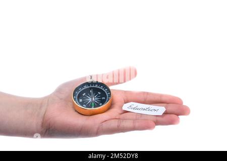 Isolated compass in hand on a white background Stock Photo