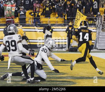 Las Vegas Raiders safety Duron Harmon celebrates his interception during an  NFL football game against the Seattle Seahawks, Sunday, Nov. 27, 2022, in  Seattle.The Raiders won 40-34 in overtime. (AP Photo/Caean Couto