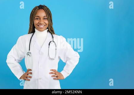 African female doctor smiling at the camera Stock Photo