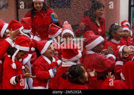 Kathmandu, NE, Nepal. 25th Dec, 2022. Children in a Santa Claus costume