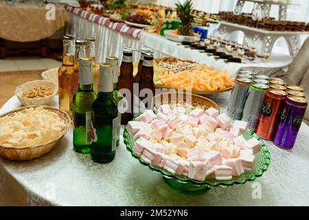 Ivano-Frankivsk, Ukraine 2021: Festive table snacks and drinks, food and drinks. Stock Photo