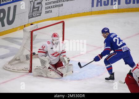 Saint Petersburg, Russia. 24th Dec, 2022. Spartak Hockey Club player, Patrik Rybar (No.42) and SKA Hockey Club player, Dmitry Jaskin (No.23) seen in action during the Kontinental Hockey League, regular season KHL 2022 - 2023 between SKA Saint Petersburg and Spartak Moscow at the Ice Sports Palace.(Final score; SKA Saint Petersburg 4:2 Spartak Moscow) Credit: SOPA Images Limited/Alamy Live News Stock Photo