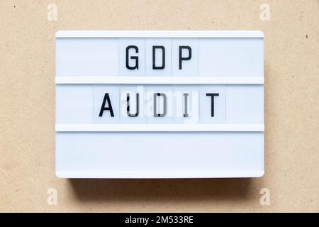 Lightbox with word GDP (Good distribution practice) audit on wood background Stock Photo