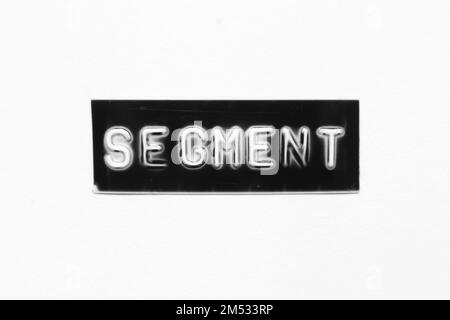 Black color banner that have embossed letter with word segment on white paper background Stock Photo
