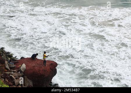 Varkala, Kerala, India. 25th Dec, 2022. People gather at a beach in