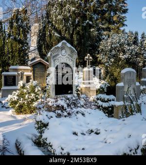 SCHROBENHAUSEN, GERMANY - DECEMBER 17: Snow in the landmarked historic cemetery in Schrobenhausen, Germany on December 17, 2022 Stock Photo