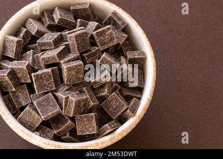 Milk Chocolate Chunks in a Bowl Stock Photo