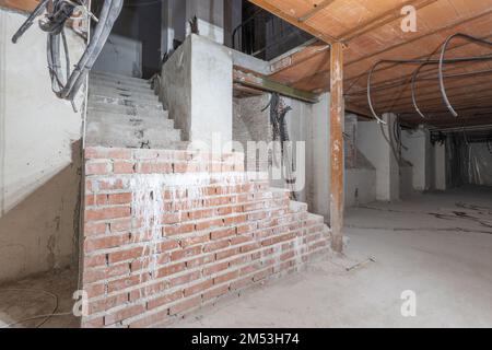 Unfinished concrete building without windows. Isolated on white Stock ...