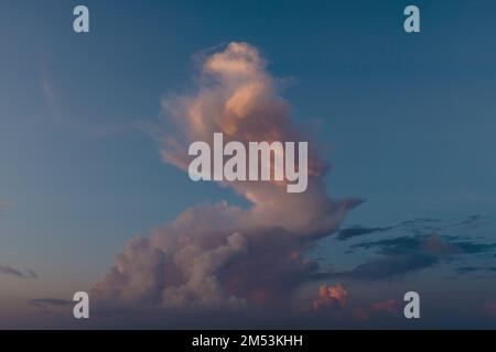 Beautiful colored cloudy evening sky. Sky with clouds at sunset. Abstract sky background. Stock Photo