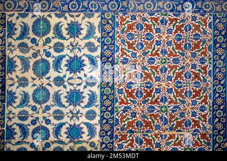 Seamless pattern white Turkish tiles with blue ornaments. Old surface texture, wall in mosque Stock Photo