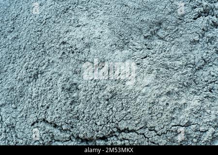Gray wet cement powder on a construction building Stock Photo
