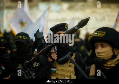 Members of the Al-Quds Brigades a military wing of Palestinian Islamic Jihad Movement take part in a march in solidarity with people in Jerusalem and West Bank on December 25, 2022. Photo by Ramez Habboub/ABACAPRESS.COM Stock Photo