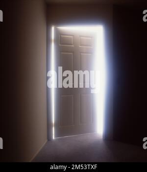 Symbolic shot of light coming through slightly opened door Stock Photo