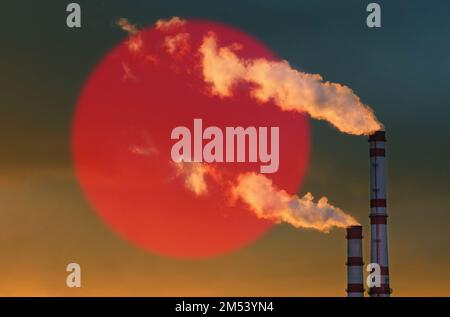 Ecological concept. Against the background of the flag of Bangladesh, smoke from the pipes of an industrial enterprise emits smoke polluting the air. Stock Photo