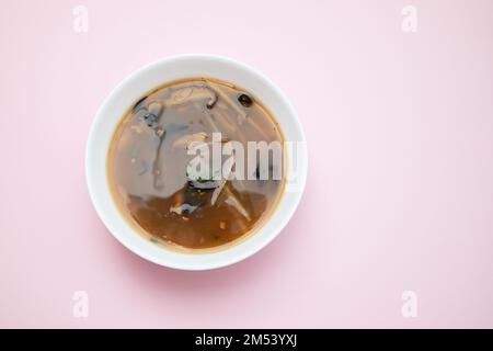 Traditional Japanese hot and sour soup cooked with greens. Asian cuisine Stock Photo