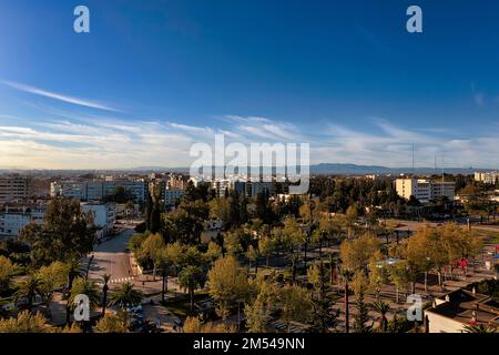 Panoramic view over streets and houses to the surrounding hills, Meknes skyline, view from above, Morocco Stock Photo