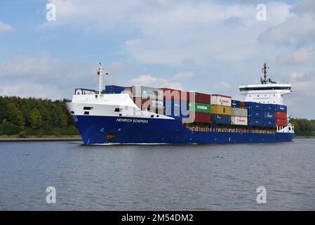 Container ship Heinrich Schepers sails through the Kiel Canal, Schleswig-Holstein, Germany Stock Photo