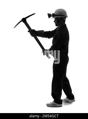 Silhouette of male miner with pick on white background Stock Photo