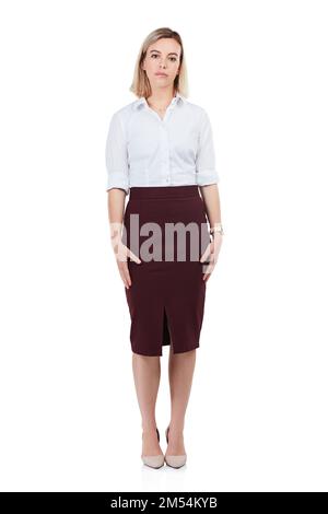 Perfectly styled for business. Studio shot of an attractive young businesswoman posing against a white background. Stock Photo