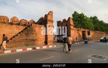 Chiang Mai, Thailand.November 07, 2022. Pratu Tha Phae gate. Tourists and daily life in front of the historical city walls. Stock Photo
