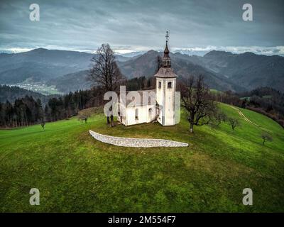 Aerial view of Saint Thomas Church. Photo taken on 30th of November 2022 in the town of Skofja Loka, Upper Carniola region, Slovenia. Stock Photo