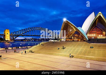 Sydney. New South Wales. Australia. The Opera House at sunset and the harbour bridge Stock Photo