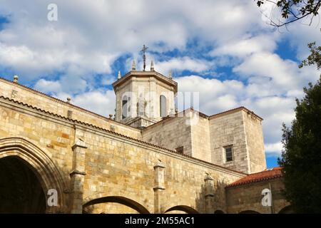 Tower with a statue and cross Santander Cathedral from the cloisters in the city centre of Santander Cantabria Spain Stock Photo