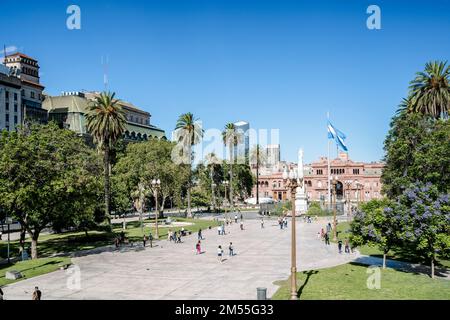 Buenos Aires, Argentina - December 20, 2022: Plaza de Mayo in Buenos Aries. Central square in Buenos Aires with the Argentinean flag in the summer next to the presidential palace. Attractions, travel and tourism in Argentina. High quality photo Stock Photo