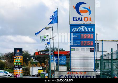 Forecourt price signs at a filling station showing diesel at 199.9 and petrol at 175.9. Stock Photo