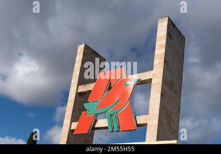 Marratxi, Spain; december 16 2022: Main facade of the multinational supermarket chain Alcampo, part of the Auchan group, in the Mallorcan town of Marr Stock Photo