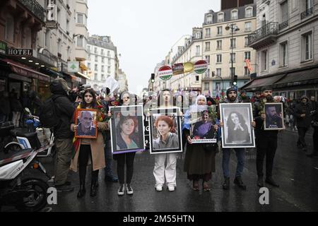 Paris, France. 26th Dec 2022. White march in memory of the three victims of the racist attack against the Kurdish community perpetrated on Friday 23 December. Paris, France on December 26, 2022. The march begins at 16 rue d'Enghien in Paris, the site of the shooting, and heads towards 147 rue La Fayette, where three Kurdish activists were killed ten years ago. Photo by Eliot Blondet/ABACAPRESS.COM Credit: Abaca Press/Alamy Live News Stock Photo