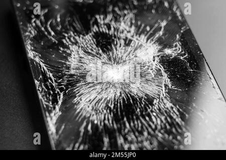 Broken cracked mobile phone touchscreen closeup Stock Photo
