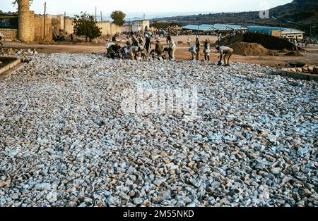 Ethiopia, 1970s, Harar, workers building a new road with stones, Harari region, East Africa, Stock Photo