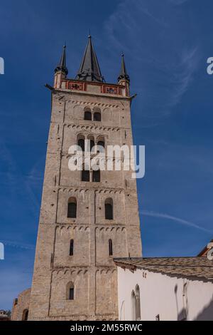 The tower from the Cathedral in Susa, Piedmont in Italy, background blue sky Stock Photo