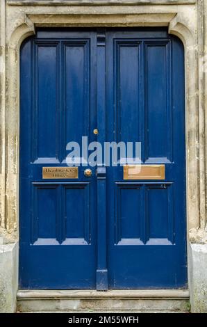 View from the street of the blue door entrance to the Headmaster's Offices at Winchester College public school in Hampshire. Stock Photo