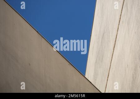 Modern architecture, concrete walls with blue sky - geometric shape Stock Photo
