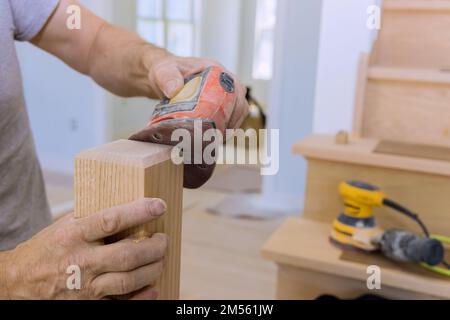Grinding handrails with using polishing machine refinishing stairwell ...