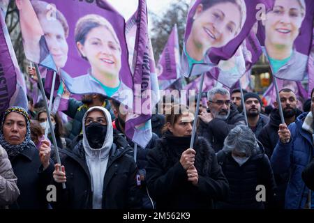 Paris, Ile de France, FRANCE. 26th Dec, 2022. People holding flags with the faces of the three Kurds killed on December 23th 2022 are walking through the center of Paris. The man who was arrested after the crime on december 23th 2022, admits racial reasons for the killings. (Credit Image: © Remon Haazen/ZUMA Press Wire) Stock Photo