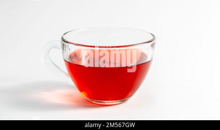 Glass cup with tea on a white background isolated. Stock Photo