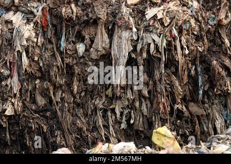 Gazipur, Gazipur, Bangladesh. 26th Dec, 2022. A pile of garbage like a mountain near Gazipur city. All the garbage of Gazipur City Corporation area is dumped here. Hundreds of tons of garbage are dumped every day. These wastes are polluting the environment very badly. Methane gas released from these wastes is a big threat to the Ozone layer. (Credit Image: © Syed Mahabubul Kader/ZUMA Press Wire) Stock Photo