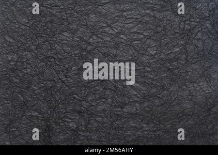 background and texture of black wrinkled art paper Stock Photo