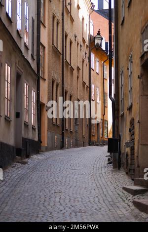 A empty alley amidst buildings in city Stock Photo